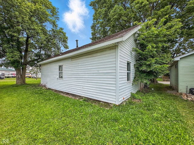 356 S 7th St, Frankfort, IN 46041 - view of property exterior with a yard