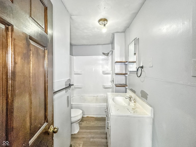 356 S 7th St, Frankfort, IN 46041 - bathroom with vanity, wood finished floors, and shower / bathtub combination