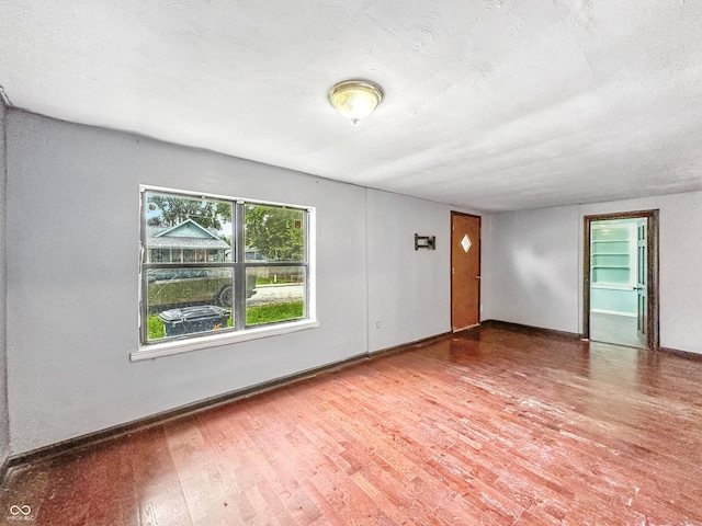 356 S 7th St, Frankfort, IN 46041 - unfurnished room with wood finished floors and baseboards