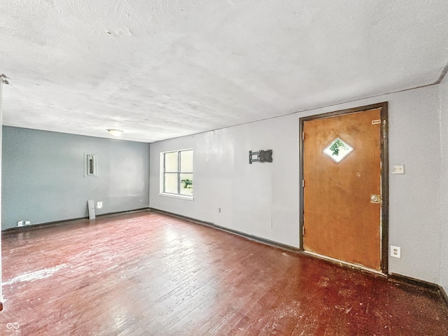 356 S 7th St, Frankfort, IN 46041 - unfurnished room featuring wood finished floors and a textured ceiling