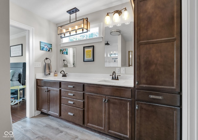 3101 N Washington Blvd, Indianapolis, IN 46205 - full bath featuring double vanity and wood finished floors