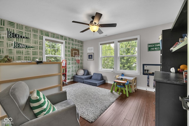 3101 N Washington Blvd, Indianapolis, IN 46205 - living area with a ceiling fan, dark wood-type flooring, and wallpapered walls