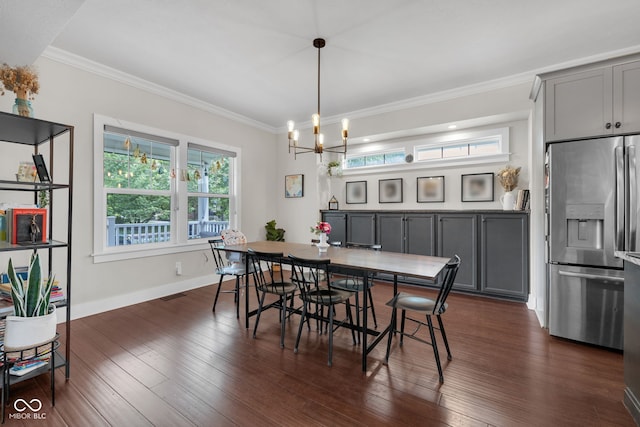 3101 N Washington Blvd, Indianapolis, IN 46205 - dining area featuring a chandelier, healthy amount of natural light, ornamental molding, and dark wood finished floors