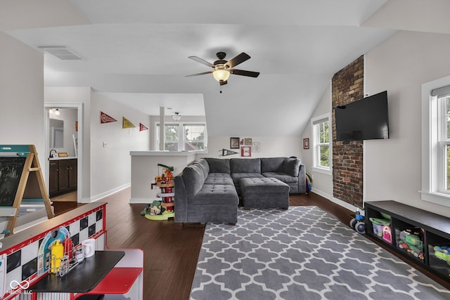3101 N Washington Blvd, Indianapolis, IN 46205 - living area featuring wood finished floors, ceiling fan, healthy amount of natural light, and vaulted ceiling