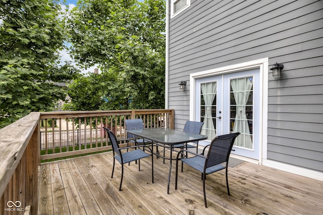 3101 N Washington Blvd, Indianapolis, IN 46205 - wooden terrace with outdoor dining area and french doors