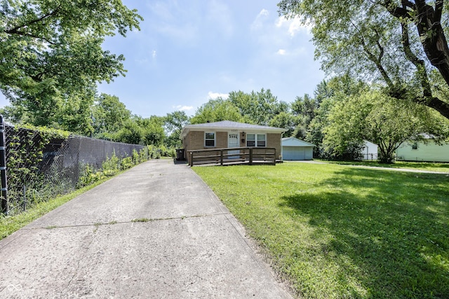1217 S Ewing St, Indianapolis, IN 46203 - view of front of property with driveway and brick siding
