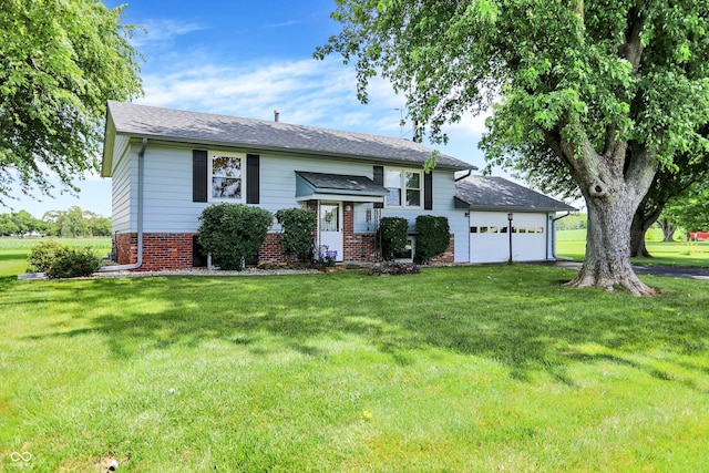 2777 S 600 E, Franklin, IN 46131 - bi-level home with an attached garage, brick siding, and a front yard