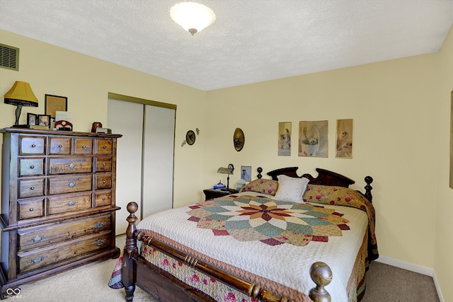 2777 S 600 E, Franklin, IN 46131 - bedroom with carpet flooring, a closet, and a textured ceiling