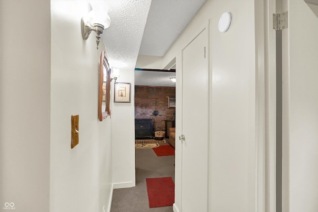 2777 S 600 E, Franklin, IN 46131 - hallway featuring a textured ceiling and carpet flooring