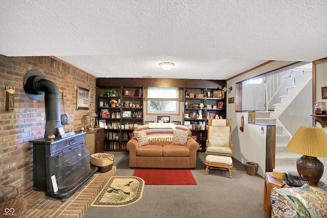 2777 S 600 E, Franklin, IN 46131 - living area with a wood stove, a textured ceiling, stairway, and brick wall