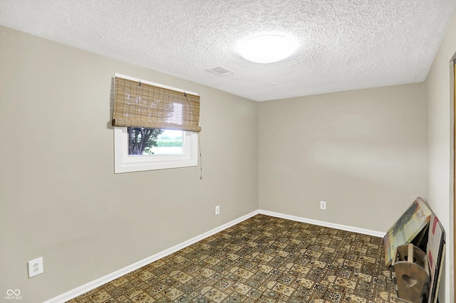 2777 S 600 E, Franklin, IN 46131 - spare room with a textured ceiling and baseboards