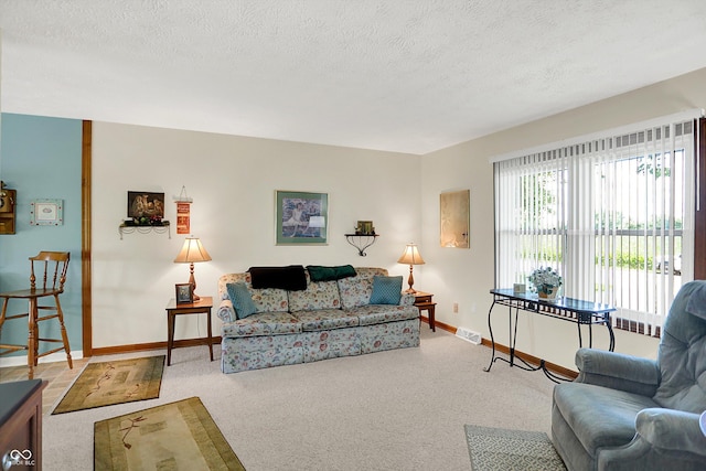 2777 S 600 E, Franklin, IN 46131 - carpeted living room with a textured ceiling