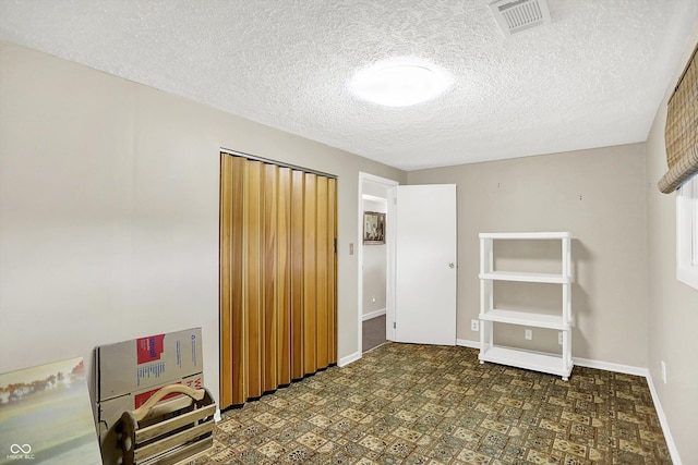 2777 S 600 E, Franklin, IN 46131 - unfurnished bedroom with a textured ceiling and baseboards