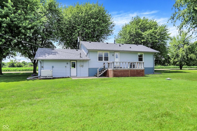 2777 S 600 E, Franklin, IN 46131 - rear view of house featuring a deck, a lawn, and stairway