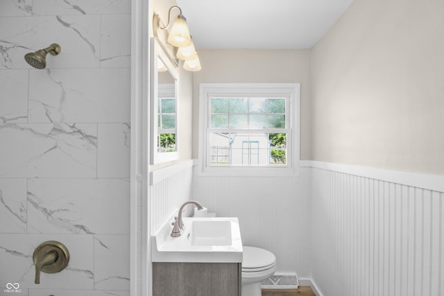 2829 Dakota Dr, Anderson, IN 46012 - bathroom with vanity, a marble finish shower, and a wainscoted wall