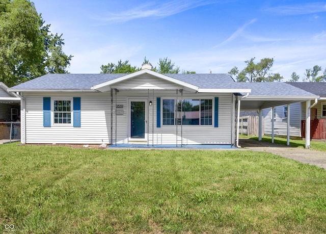 2829 Dakota Dr, Anderson, IN 46012 - ranch-style home with a carport, roof with shingles, and concrete driveway