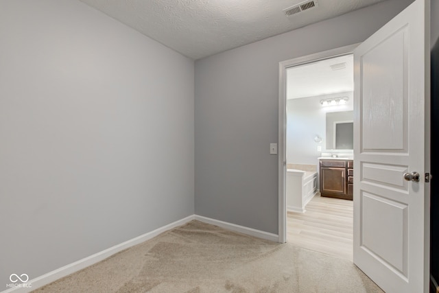14620 Hinton Dr, Fishers, IN 46037 - empty room with light colored carpet and a textured ceiling