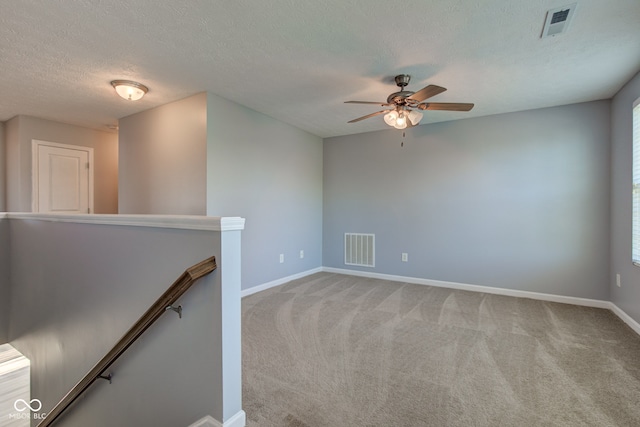 14620 Hinton Dr, Fishers, IN 46037 - carpeted empty room featuring a ceiling fan and a textured ceiling