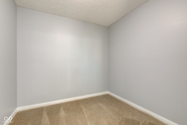 14620 Hinton Dr, Fishers, IN 46037 - empty room featuring light colored carpet and a textured ceiling