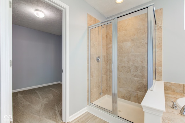 14620 Hinton Dr, Fishers, IN 46037 - full bathroom with a shower stall and a textured ceiling