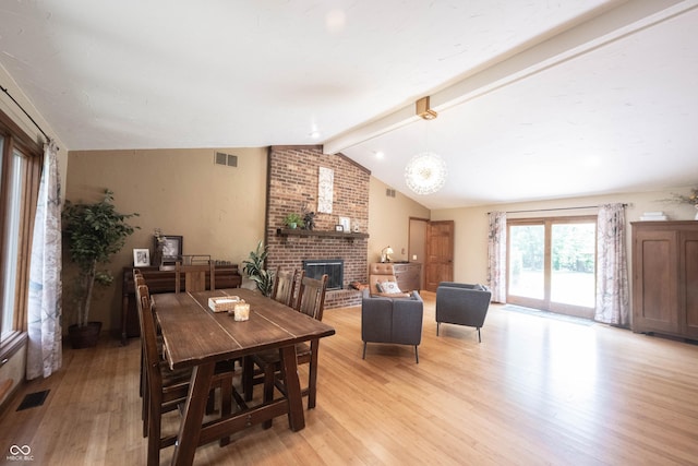 3711 Tara Ct, Carmel, IN 46074 - dining space featuring a fireplace and light wood finished floors