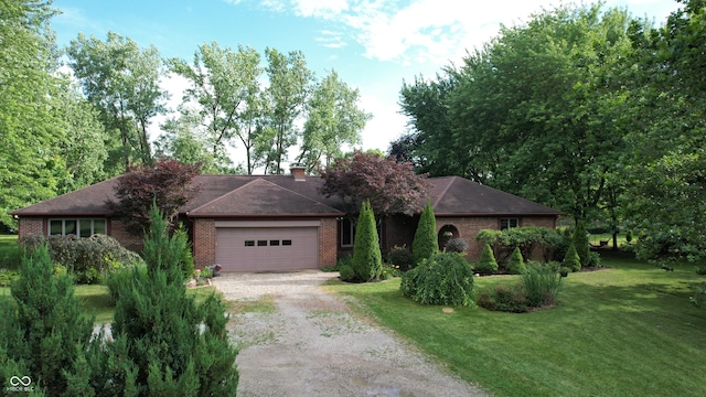 3711 Tara Ct, Carmel, IN 46074 - single story home featuring dirt driveway, brick siding, a front yard, and a garage