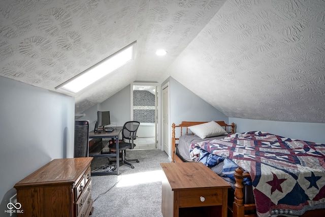 5902 Oak Ln, Anderson, IN 46013 - carpeted bedroom featuring vaulted ceiling, a textured ceiling, a desk, and a skylight