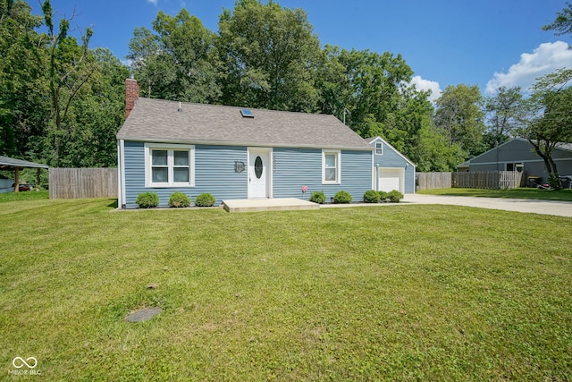 5902 Oak Ln, Anderson, IN 46013 - view of front facade featuring driveway, a chimney, a garage, and a shingled roof