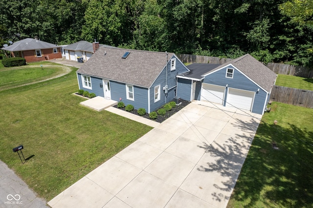 5902 Oak Ln, Anderson, IN 46013 - view of front of property with roof with shingles, driveway, a chimney, and an attached garage