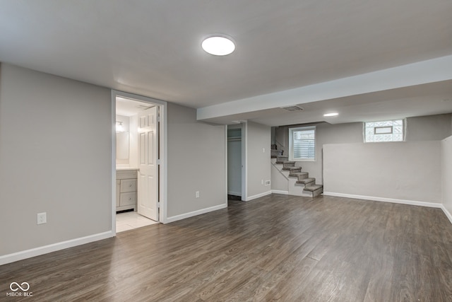 4155 Graceland Ave, Indianapolis, IN 46208 - below grade area featuring wood finished floors and stairway