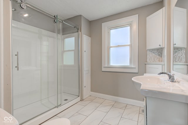 4155 Graceland Ave, Indianapolis, IN 46208 - full bath with marble finish flooring, a stall shower, and vanity