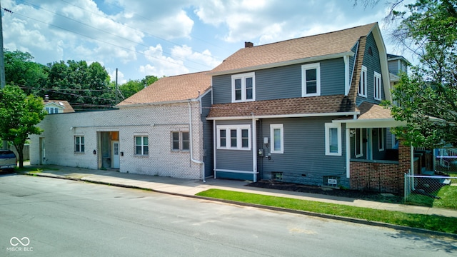 4155 Graceland Ave, Indianapolis, IN 46208 - view of front of home with a shingled roof and a chimney