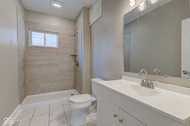 4155 Graceland Ave, Indianapolis, IN 46208 - full bath featuring vanity, a tile shower, and marble look tile flooring