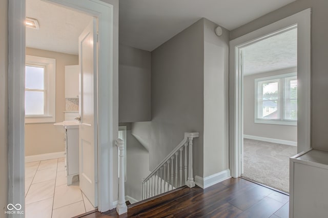 4155 Graceland Ave, Indianapolis, IN 46208 - hallway with an upstairs landing and wood finished floors