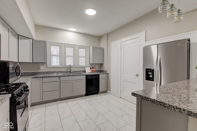 4155 Graceland Ave, Indianapolis, IN 46208 - kitchen with black appliances, gray cabinetry, dark stone countertops, a chandelier, and light marble finish floors