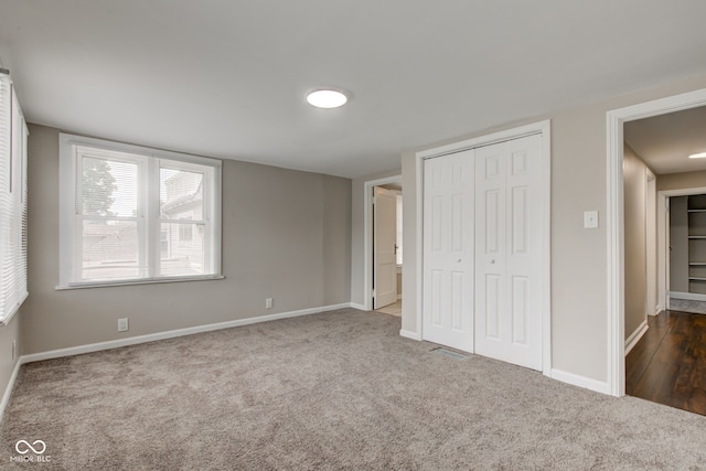 4155 Graceland Ave, Indianapolis, IN 46208 - unfurnished bedroom with carpet flooring and a closet