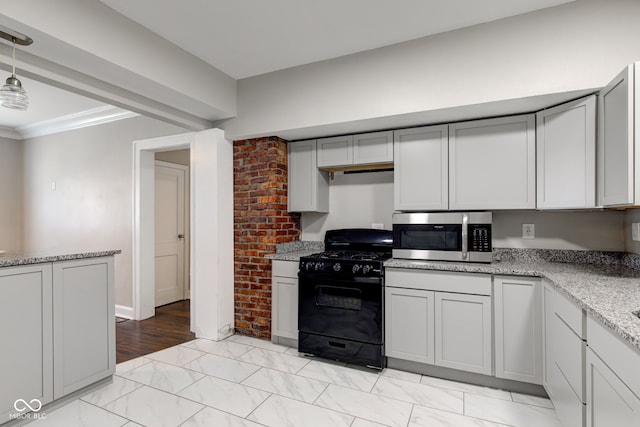 4155 Graceland Ave, Indianapolis, IN 46208 - kitchen featuring gas stove, stainless steel microwave, light stone countertops, light marble finish floors, and ornamental molding