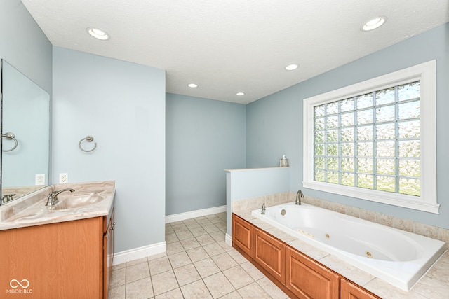3050 Montgomery Blvd, Lapel, IN 46051 - full bath with double vanity, a tub with jets, tile patterned floors, and recessed lighting