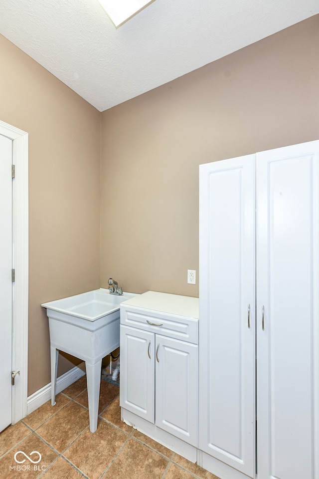 3050 Montgomery Blvd, Lapel, IN 46051 - washroom with light tile patterned flooring and baseboards
