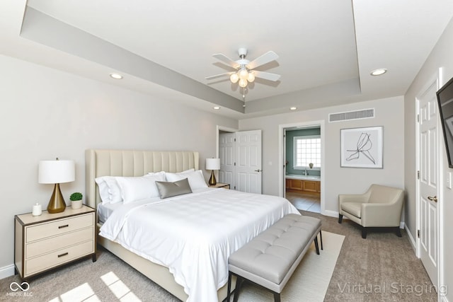 3050 Montgomery Blvd, Lapel, IN 46051 - bedroom with light colored carpet, recessed lighting, a tray ceiling, ensuite bathroom, and ceiling fan