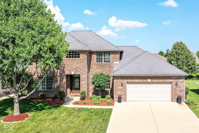 3050 Montgomery Blvd, Lapel, IN 46051 - view of front of home featuring an attached garage, a front yard, concrete driveway, brick siding, and roof with shingles