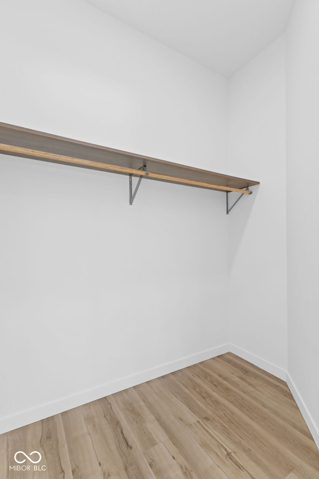 2709 Station St, Indianapolis, IN 46218 - spacious closet with light wood-style floors