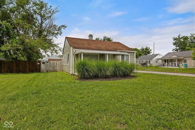 1730 S State Ave, Indianapolis, IN 46203 - view of home's exterior featuring a chimney