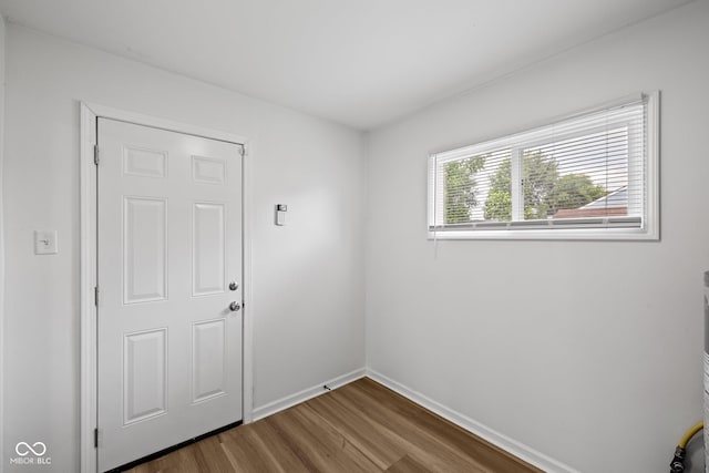 1730 S State Ave, Indianapolis, IN 46203 - empty room featuring wood finished floors and baseboards