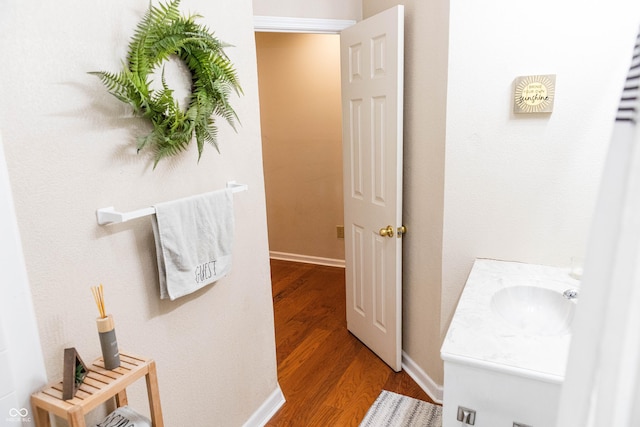 2650 S Meridian St, Indianapolis, IN 46225 - bathroom with vanity and wood finished floors