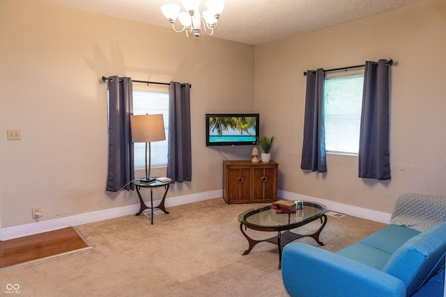 2650 S Meridian St, Indianapolis, IN 46225 - living area featuring a chandelier and carpet flooring
