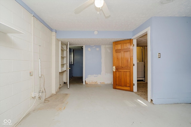 4020 Eisenhower Dr, Indianapolis, IN 46254 - empty room featuring a ceiling fan, unfinished concrete floors, washer / clothes dryer, and a textured ceiling