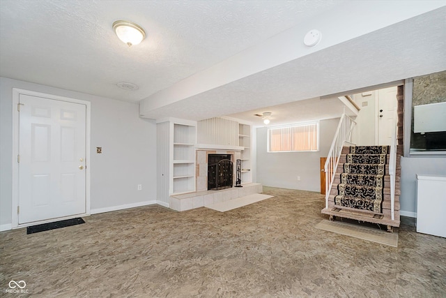 4020 Eisenhower Dr, Indianapolis, IN 46254 - unfurnished living room featuring a fireplace, a textured ceiling, stairs, built in features, and carpet