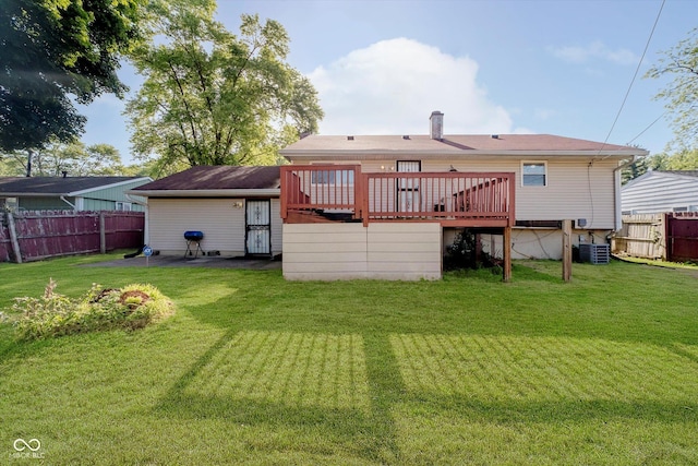 4020 Eisenhower Dr, Indianapolis, IN 46254 - rear view of house with a wooden deck and a chimney
