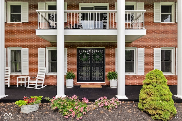 10198 N State Road 75, North Salem, IN 46165 - doorway to property featuring a balcony and brick siding